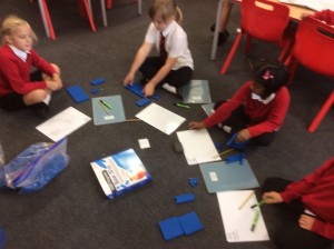 We worked really hard to begin to understand how to carry tens when adding large numbers. It's a little bit tricky even though we are brain boxes in year three so we decided to use base ten apparatus to help us visualise it and understand place value.